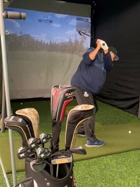Photo of golfer using Golf Simulator